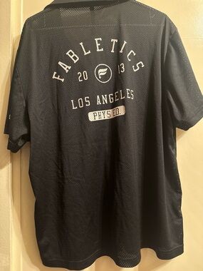 Fabletics Men’s Los Angeles Mesh Tee in Black with White Logo
